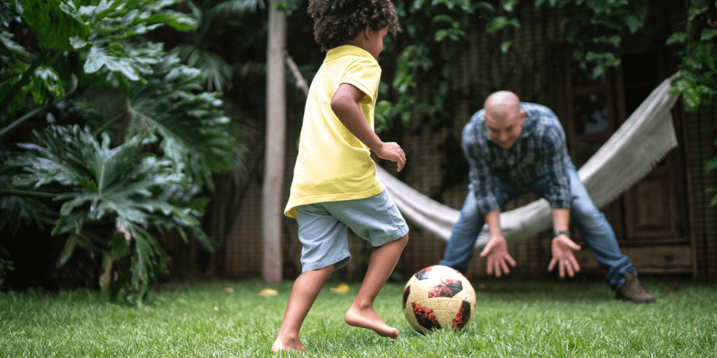 father and son playing parenting