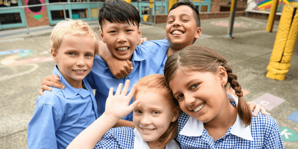 group of primary school children returning to school