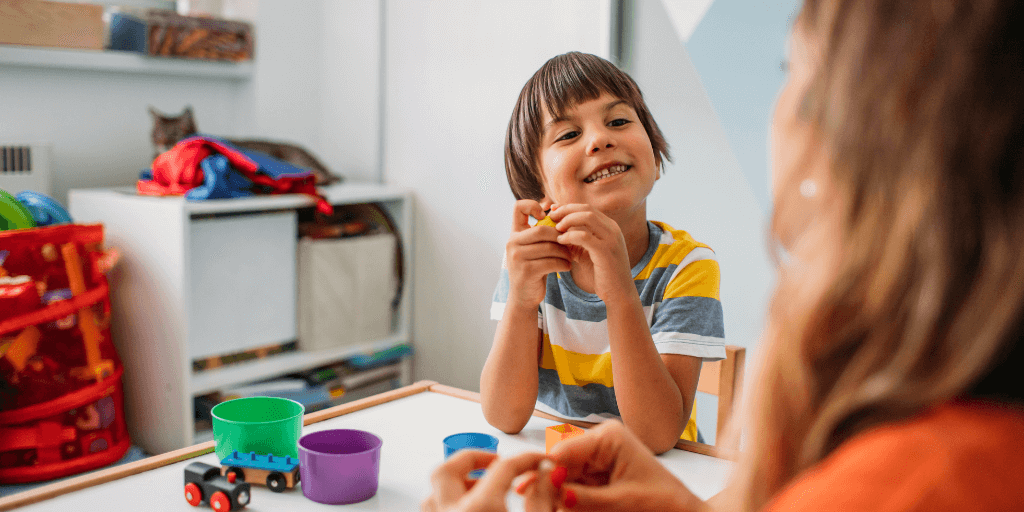 child playing with play doh