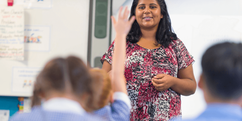 Teacher in class with students